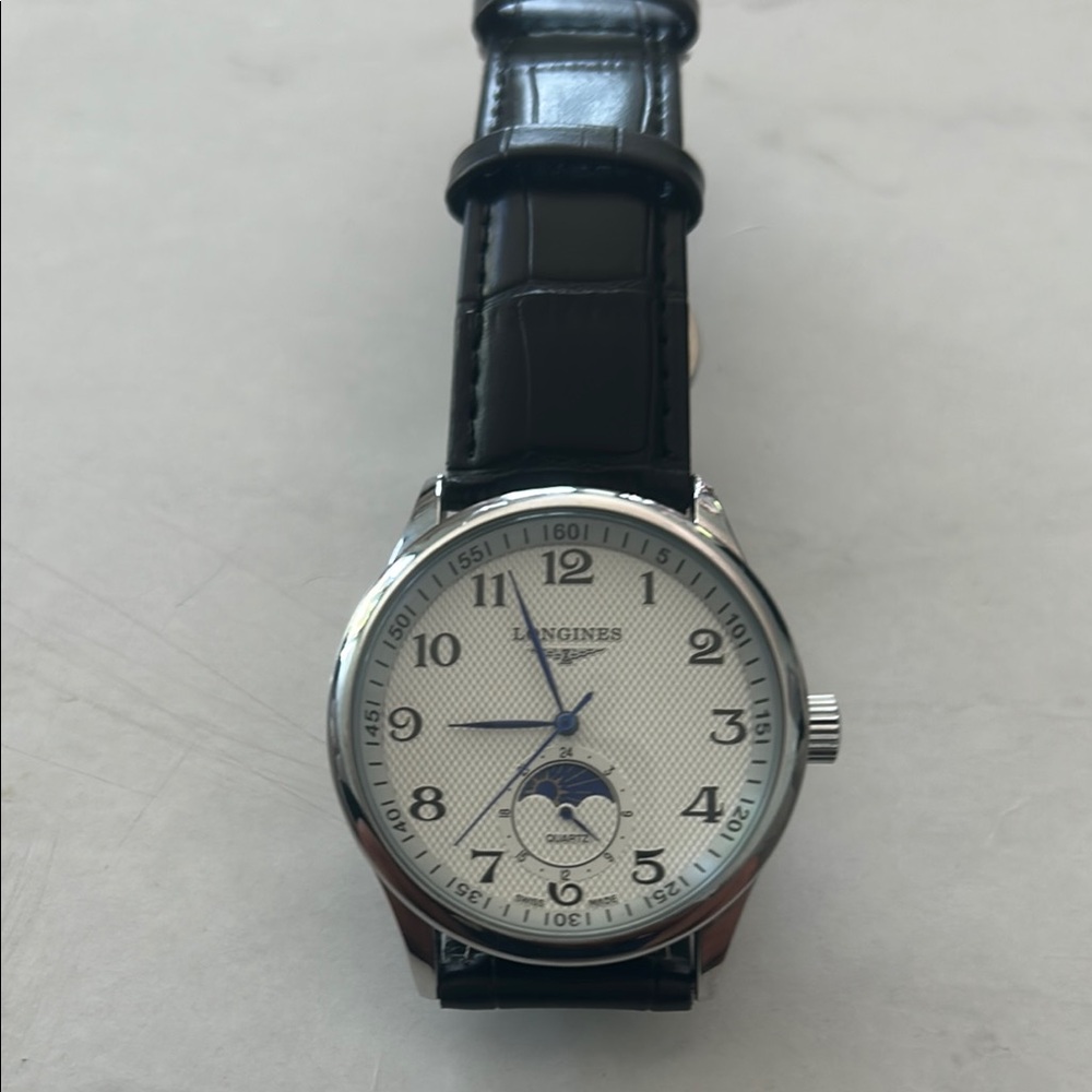 Longines Silver and Black Watch (quartz brand new battery)